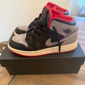 Jordan 1 Mid Black and Fire Red